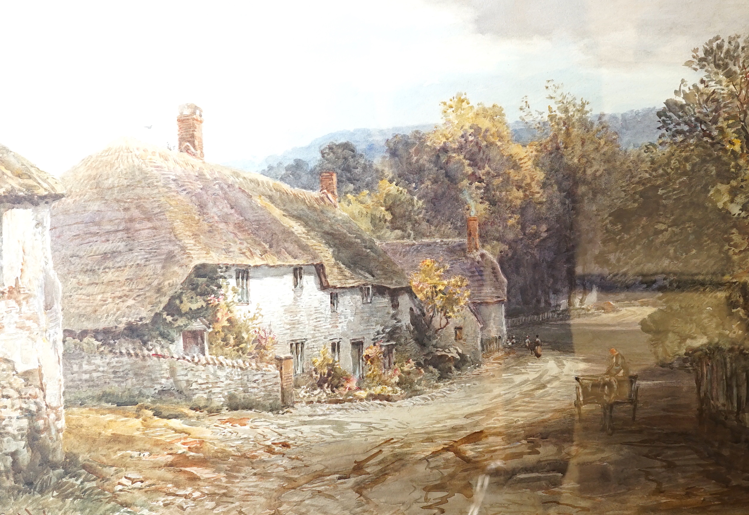 Alfred Leymann (1856-1933), watercolour, Horse and cart passing thatched cottages, signed, 53 x 74cm